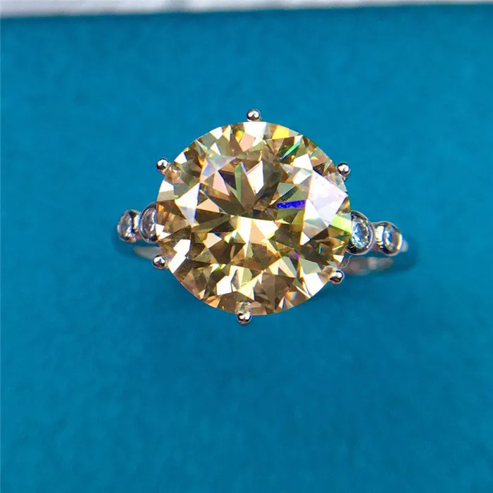 Rings Leyloon Jewelry 5 Carat Round Moissanite Ring 6 Prong Reverse Tapered Scalloped Shank VVS Vivid Yellow Rings Leyloon Jewelry 5 Carat Round Moissanite Ring 6 Prong Reverse Tapered Scalloped Shank VVS Vivid Yellow