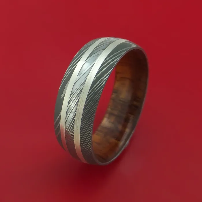 Rings Lashbrook Damascus Steel Ring with Silver Inlays and Koa Hard Wood Sleeve Rings Lashbrook Damascus Steel Ring with Silver Inlays and Koa Hard Wood Sleeve