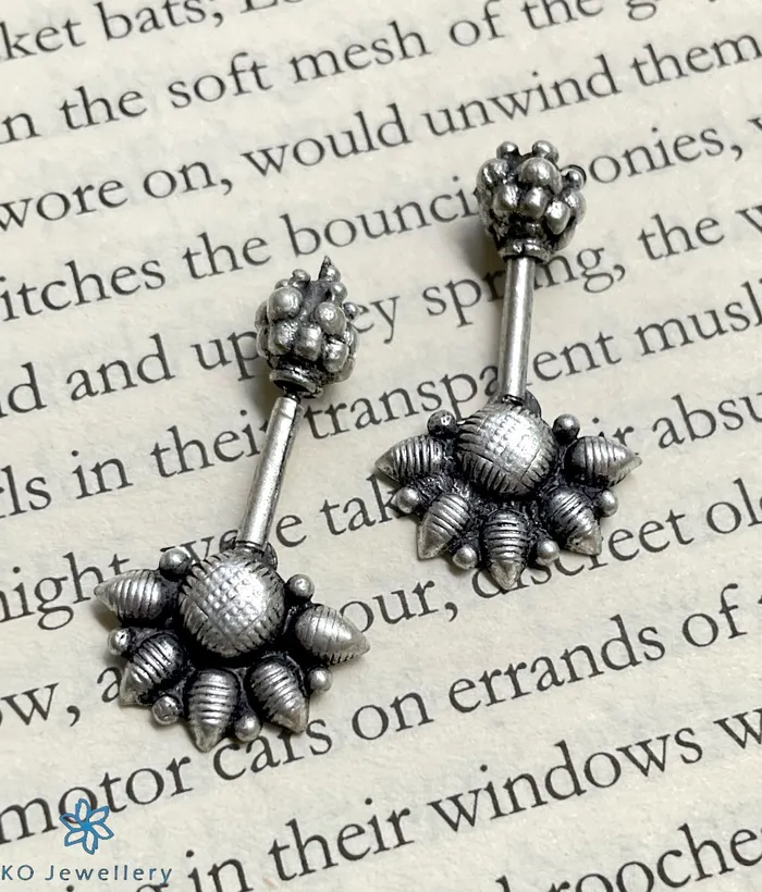 The Komolika Silver Bugudi Earrings Piercing Karwar Earrings
