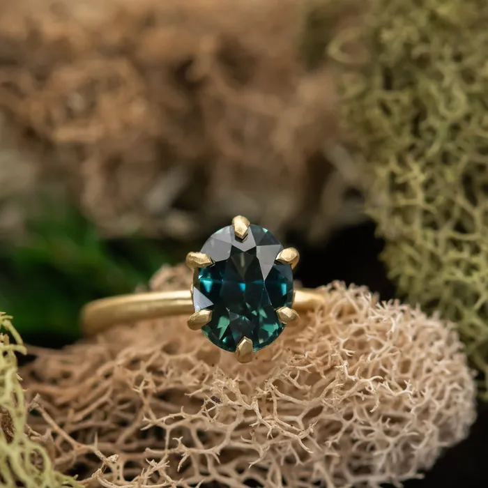Anueva Jewelry PreStyled Sets 177ct Teal Oval Madagascar Sapphire Lotus Six Prong Solitaire in Satin 18k Yellow Gold