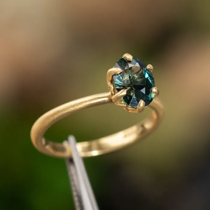Anueva Jewelry PreStyled Sets 177ct Teal Oval Madagascar Sapphire Lotus Six Prong Solitaire in Satin 18k Yellow Gold