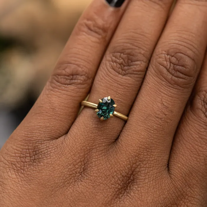 Anueva Jewelry PreStyled Sets 177ct Teal Oval Madagascar Sapphire Lotus Six Prong Solitaire in Satin 18k Yellow Gold