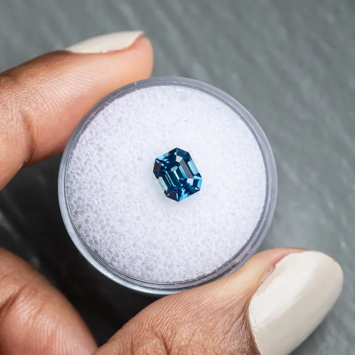 Rings 138CT EMERALD CUT MADAGASCAR SAPPHIRE OCEAN BLUE 671X551X412MM JEWELMINE GEMS