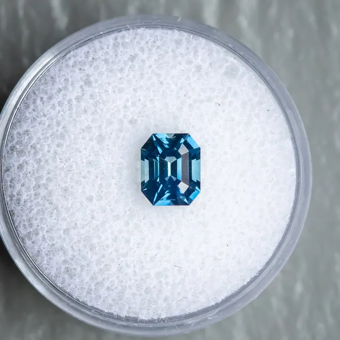 Rings 138CT EMERALD CUT MADAGASCAR SAPPHIRE OCEAN BLUE 671X551X412MM JEWELMINE GEMS